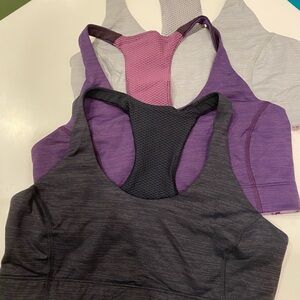 Outdoor Voices sports bras : grey/pink, plum/purple, graphite/black, sz M